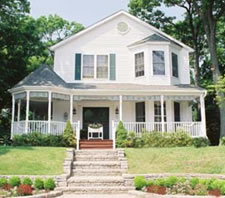 Elegant front elevation with front porch and gazebo, 2.975 square feet open floor plan to this custom modular home of 4 to 5 bedrooms, full basement and large attic area. 